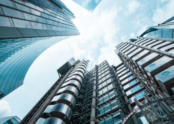 Modern skyscrapers in London financial district looking up – BIC Immigration UK business and investor visa services